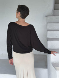 caraucci lightweight rayon jersey black long sleeve dolman top with cream hourglass skirt #color_black