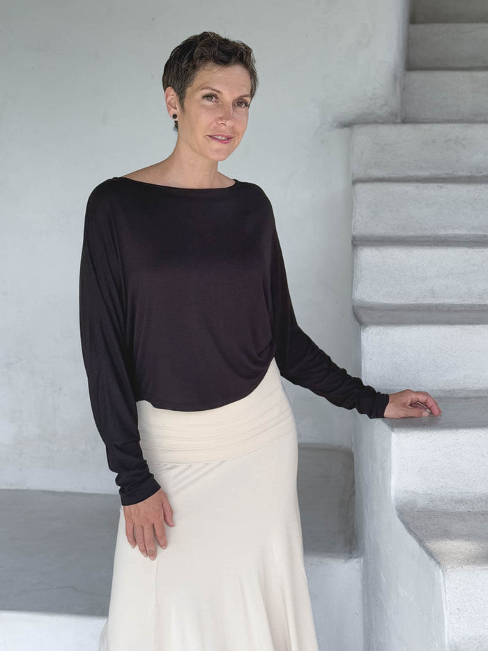 caraucci lightweight rayon jersey black long sleeve dolman top with cream hourglass skirt #color_black