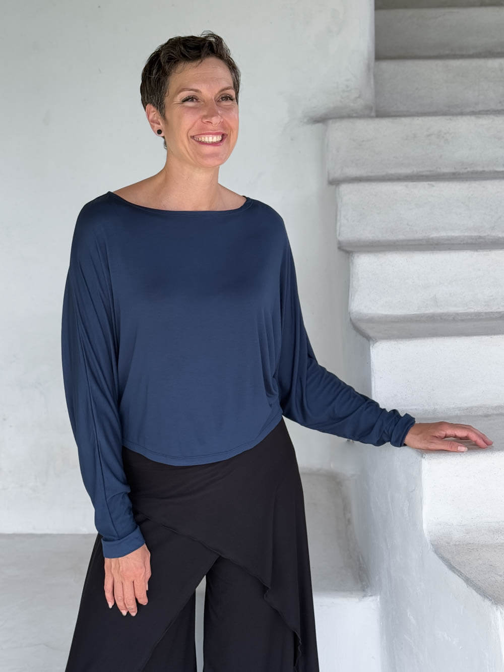 caraucci lightweight rayon jersey navy long sleeve dolman top with black wide leg slit pants #color_navy