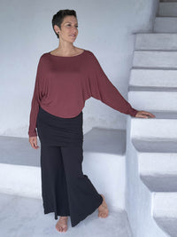 caraucci lightweight rayon jersey maroon long sleeve dolman top with black skirt over pants #color_wine