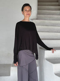 asymmetrical lightweight rayon jersey black long sleeve top #color_black