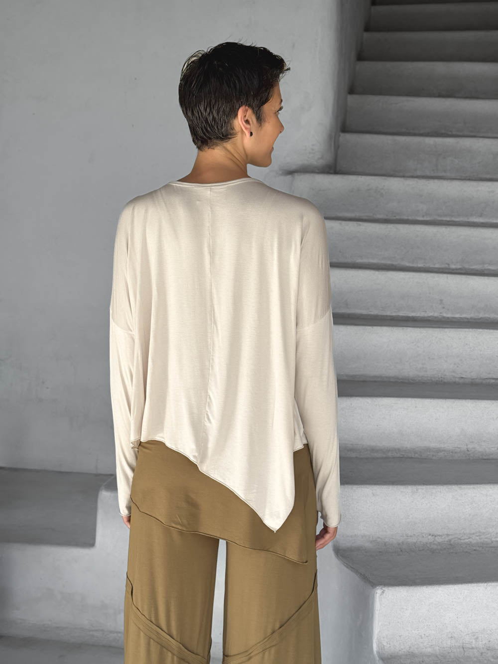 asymmetrical lightweight rayon jersey cream long sleeve top #color_cream
