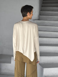 asymmetrical lightweight rayon jersey cream long sleeve top #color_cream