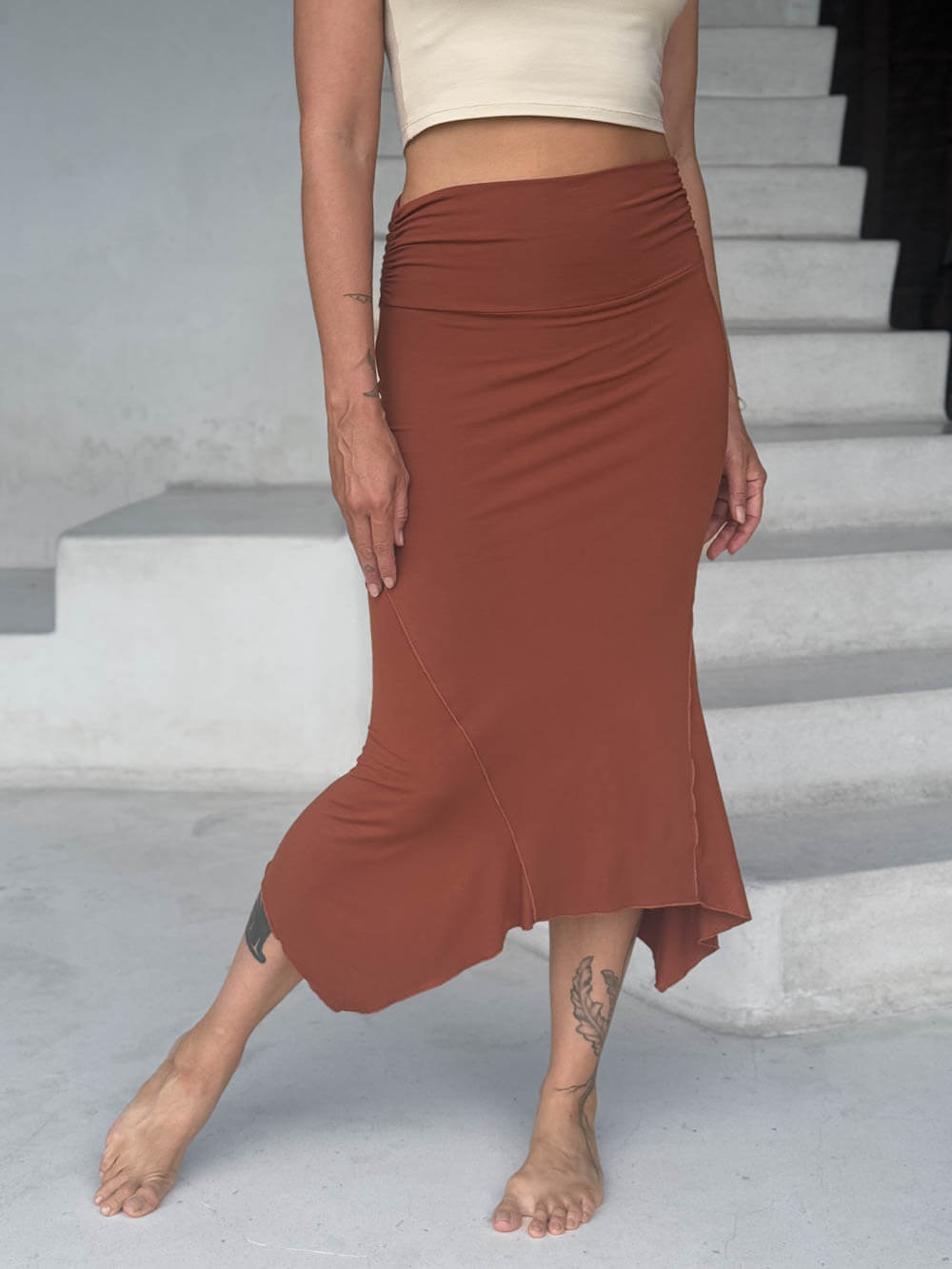 caraucci stretch rayon jersey asymmetrical copper midi skirt #color_copper