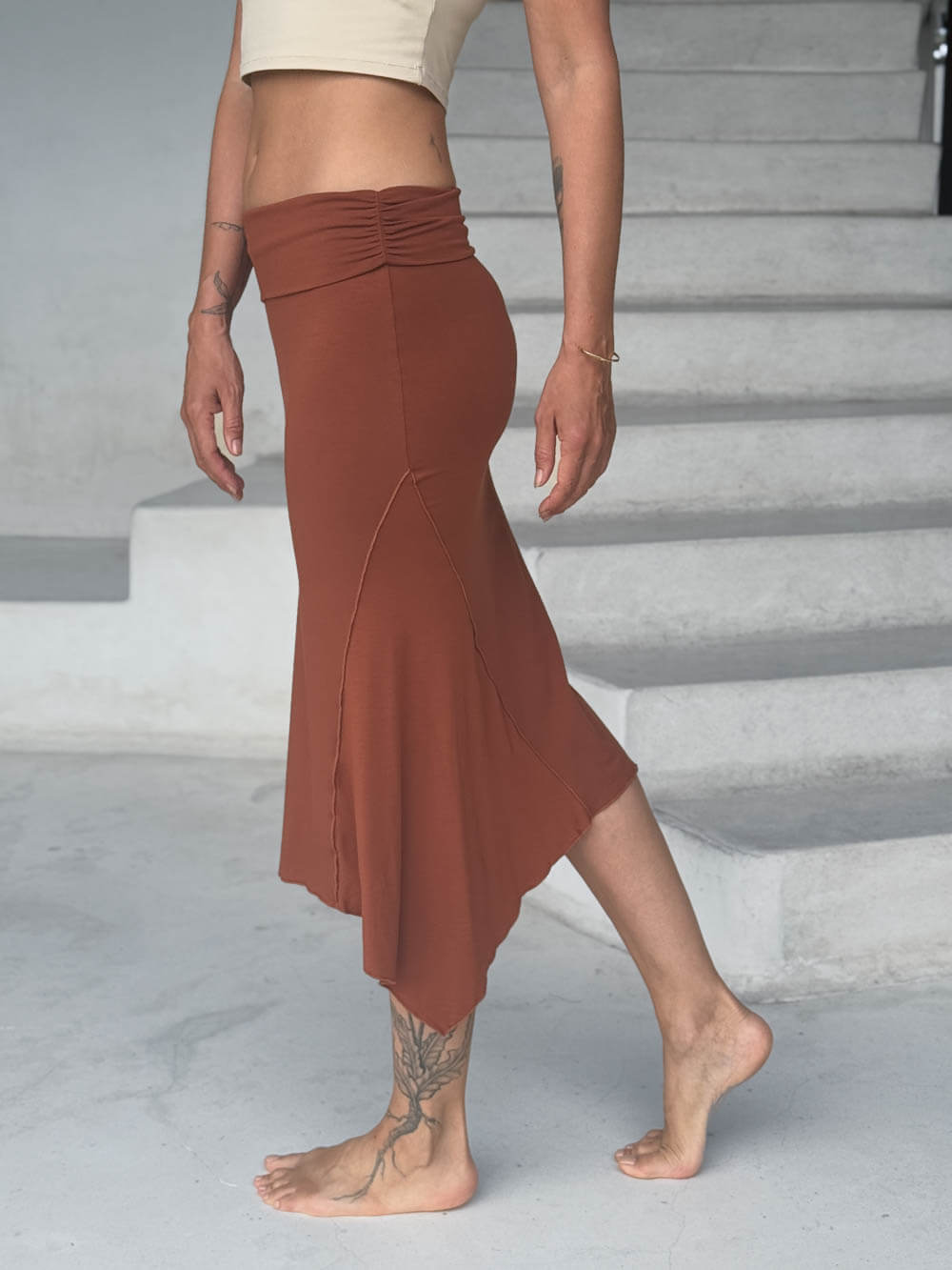 caraucci stretch rayon jersey asymmetrical copper midi skirt #color_copper