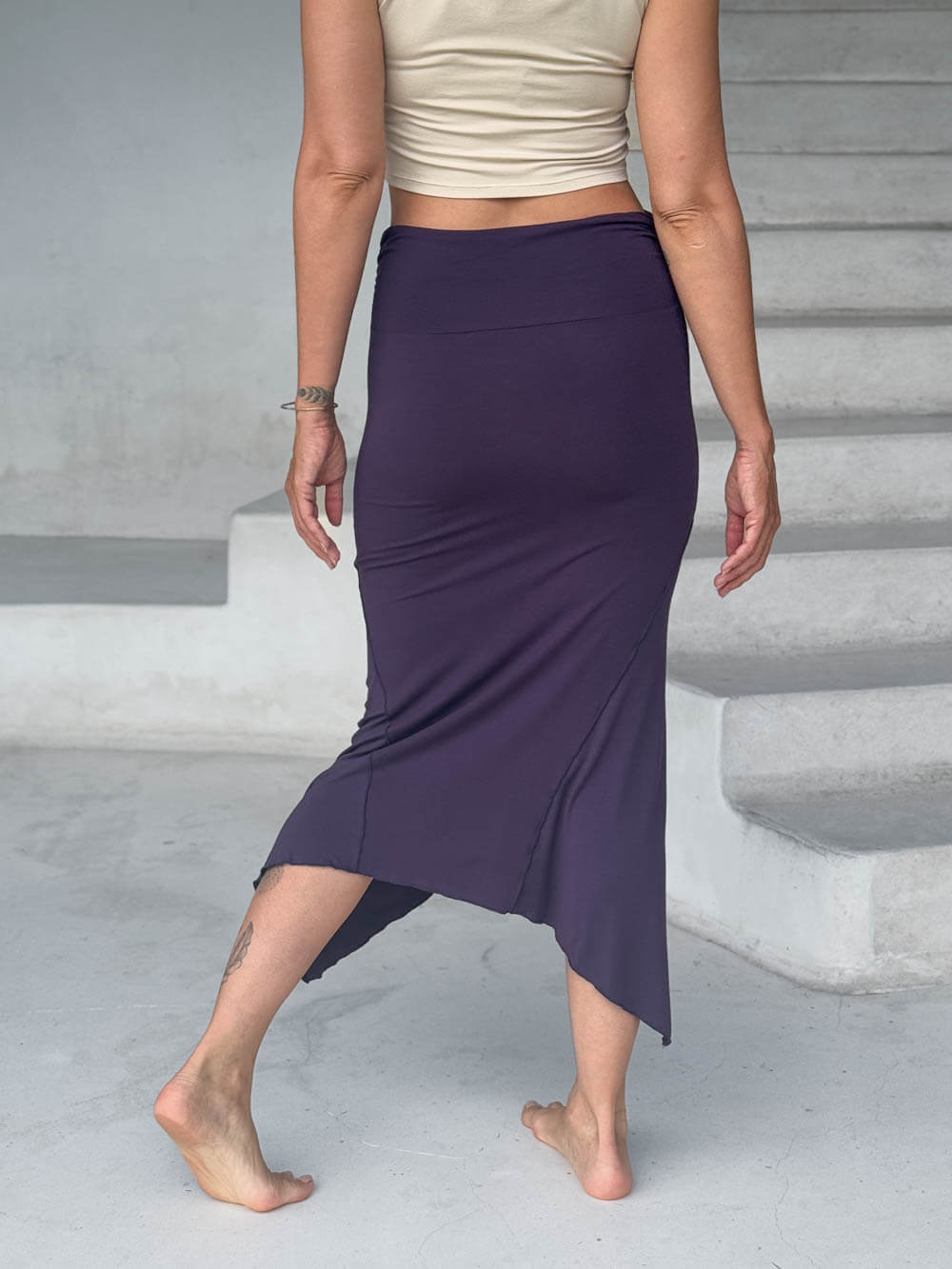 caraucci stretch rayon jersey asymmetrical purple midi skirt #color_plum