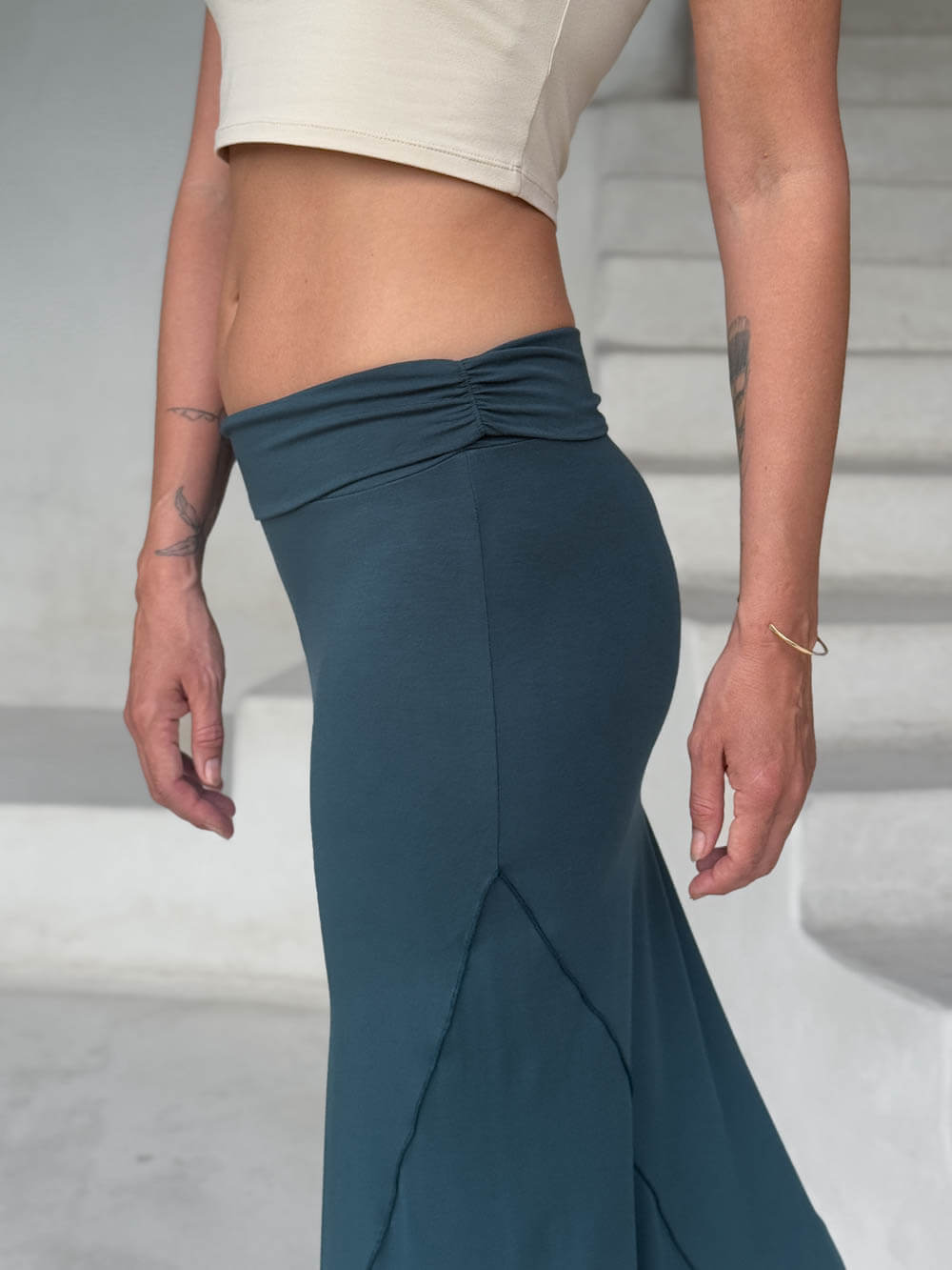 caraucci stretch rayon jersey asymmetrical teal blue midi skirt #color_teal