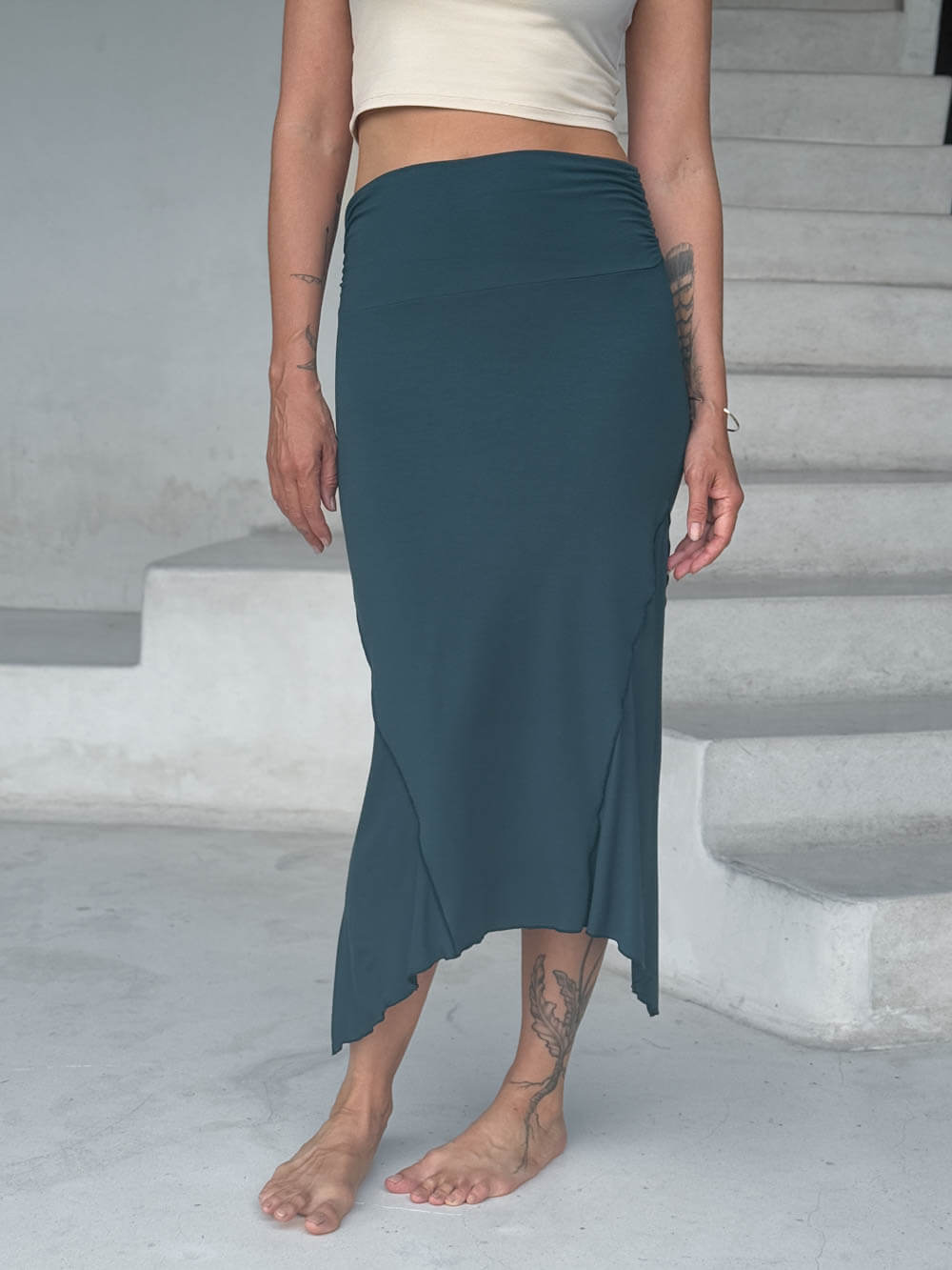 caraucci stretch rayon jersey asymmetrical teal blue midi skirt #color_teal