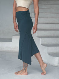 caraucci stretch rayon jersey asymmetrical teal blue midi skirt #color_teal