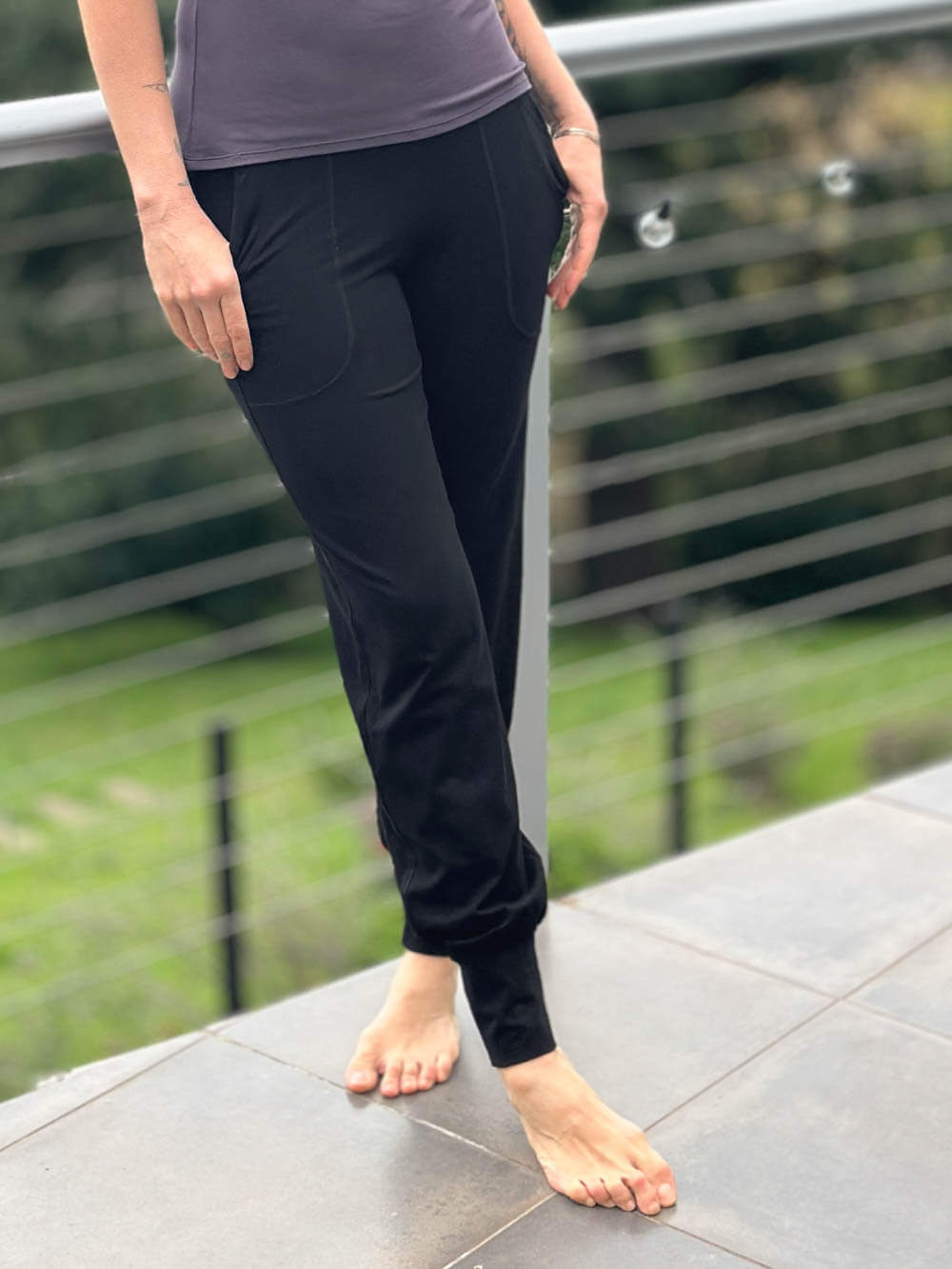 women's bamboo spandex black jogger pants with two front pockets #color_black