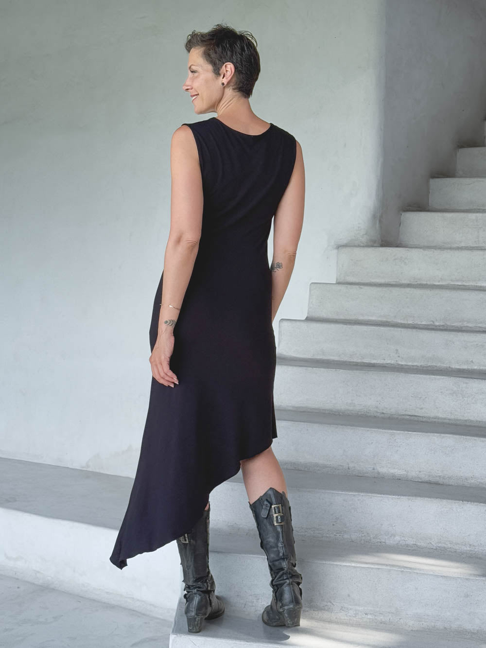 caraucci black sleeveless scoop neck bias cut asymmetrical hem dress #color_black