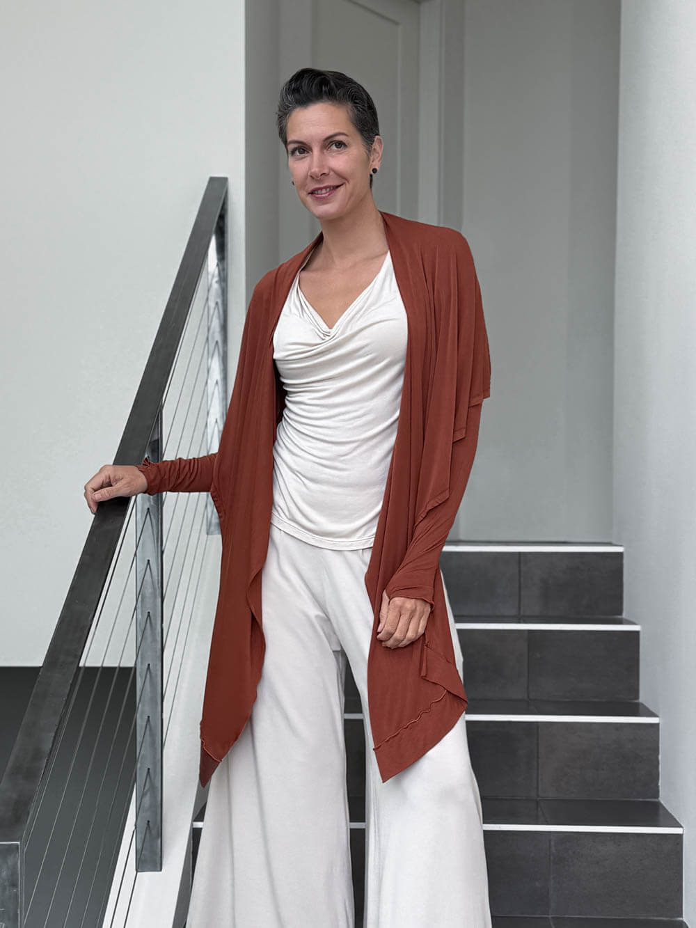 women's plant-based rayon jersey versatile rust long sleeve convertible wrap jacket with thumbholes that can be worn 2 ways #color_copper