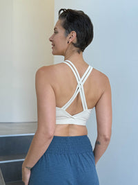 caraucci stretchy full coverage cream yoga bra top with criss cross back straps #color_cream