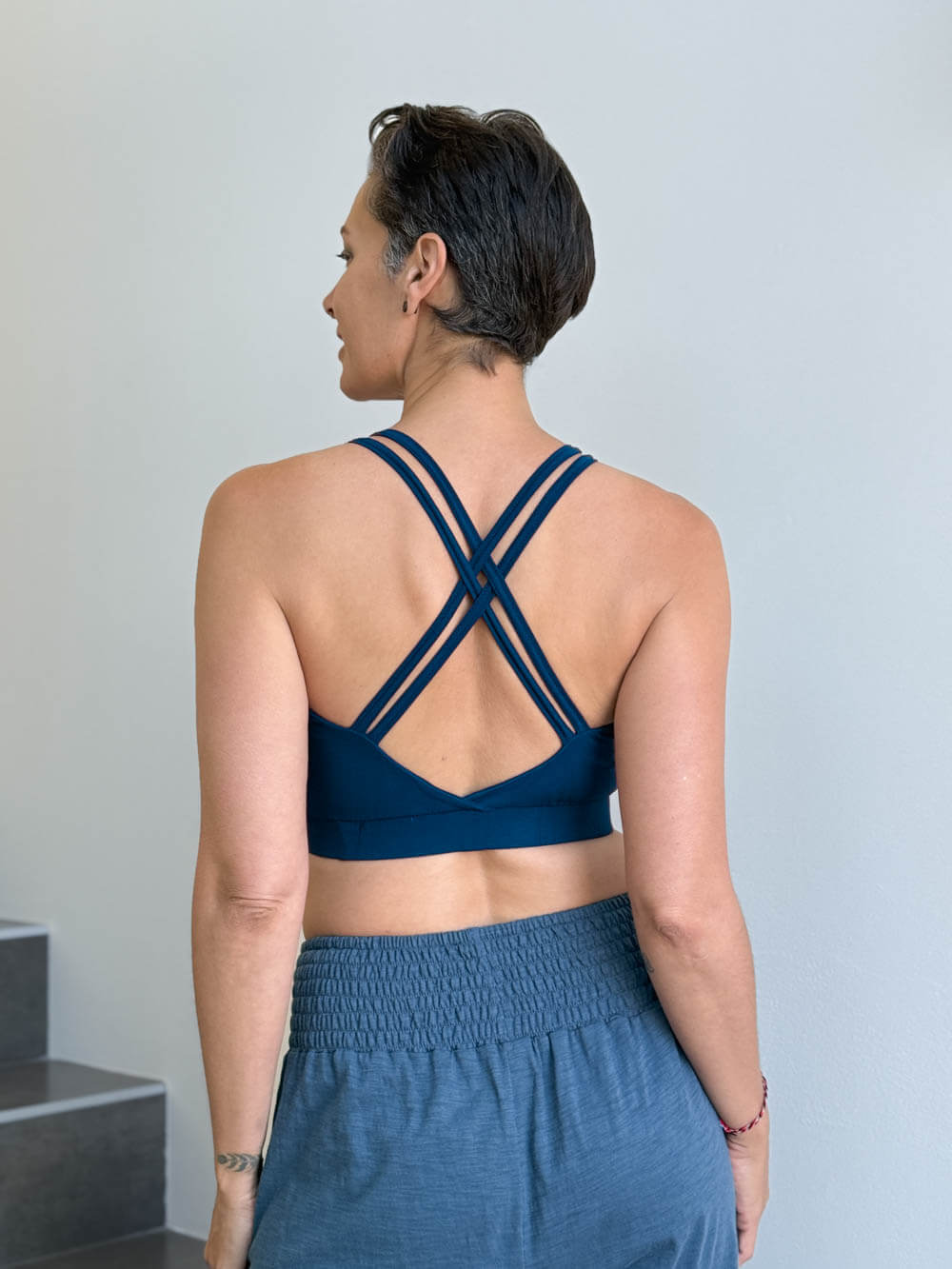 caraucci stretchy full coverage navy blue yoga bra top with criss cross back straps #color_navy