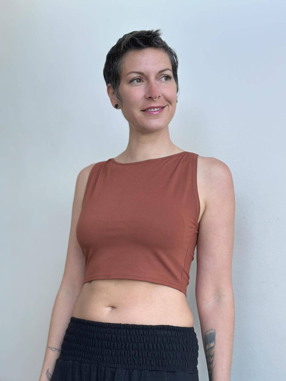 caraucci plant-based fitted orange boatneck crop top #color_copper