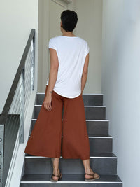 caraucci women's burnt orange wide leg cropped flare pants #color_copper