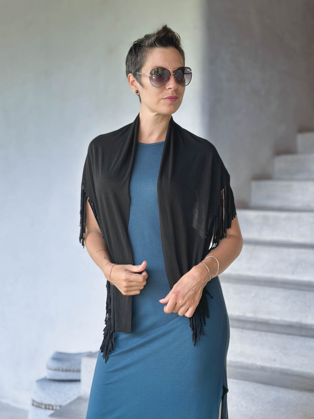 caraucci-black-fringe-scarf-worn-as-a-shawl-over-teal-dress #color_black