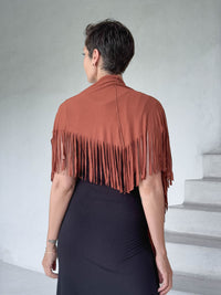 caraucci-fringe-scarf-orange-worn-as-shawl-over-black-dress #color_copper