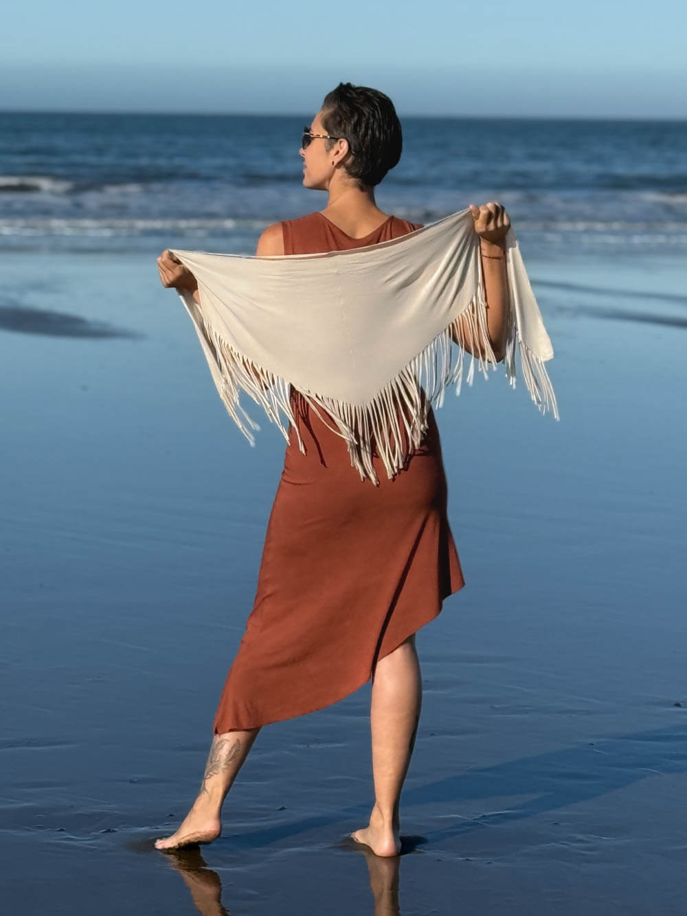 caraucci-fringe-scarf-cream-worn-as-shawl-over-copper-dress #color_cream