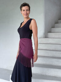 caraucci-fringe-scarf-jam-worn-as-skirt-over-black-dress #color_jam