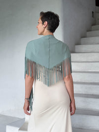 caraucci-fringe-scarf-sage-green-worn-as-shawl-over-cream-dress #color_moss