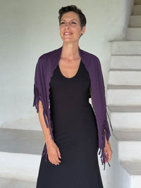 caraucci-fringe-scarf-plum-worn-as-shawl-over-black-dress #color_plum