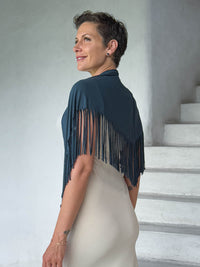 caraucci-fringe-scarf-teal-worn-as-shawl-over-cream-dress #color_teal