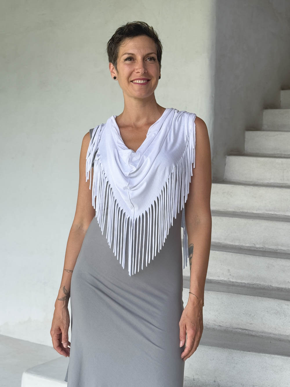 caraucci-fringe-scarf-white-worn-over-stone-dress #color_white