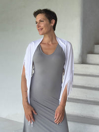 caraucci-fringe-scarf-white-worn-as-shawl-over-stone-dress #color_white