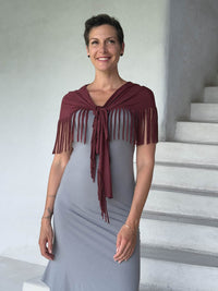 caraucci-fringe-scarf-maroon-worn-as-shawl-over-stone-dress #color_wine