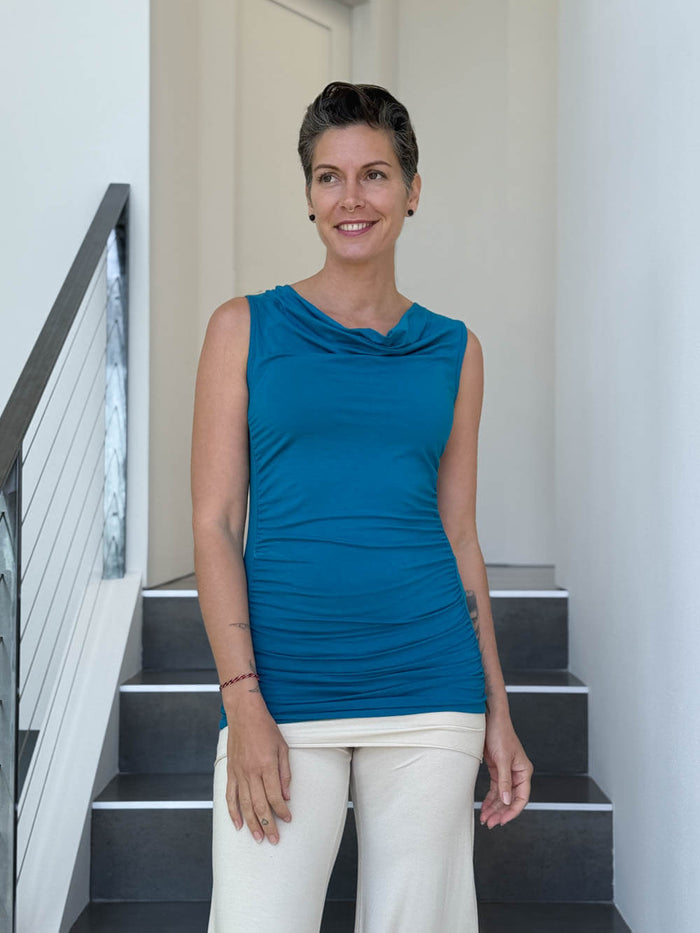 women's plant based rayon jersey turquoise top with ruching on sides and slight cowl neck #color_cosmo
