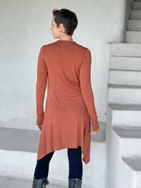 caraucci high neck orange high neck long sleeve swing tunic with thumbholes #color_copper