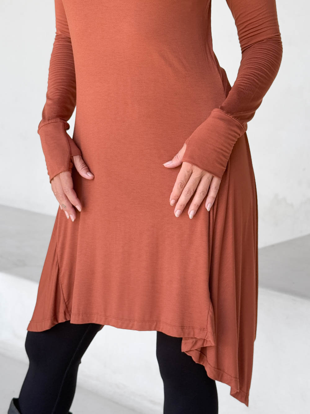 caraucci high neck orange high neck long sleeve swing tunic with thumbholes #color_copper