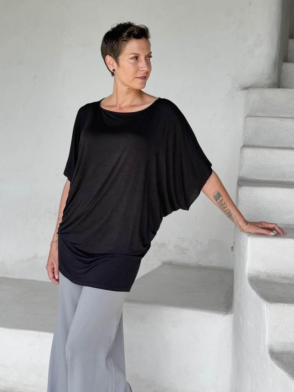 caraucci black kimono tunic worn as a tunic with stone pants #color_black