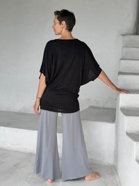 caraucci black kimono tunic worn as a tunic with stone pants #color_black
