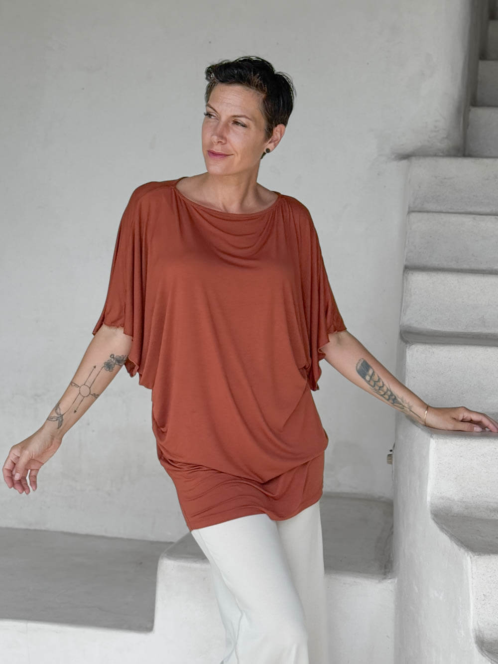 caraucci copper kimono tunic worn as a tunic with cream pants #color_copper