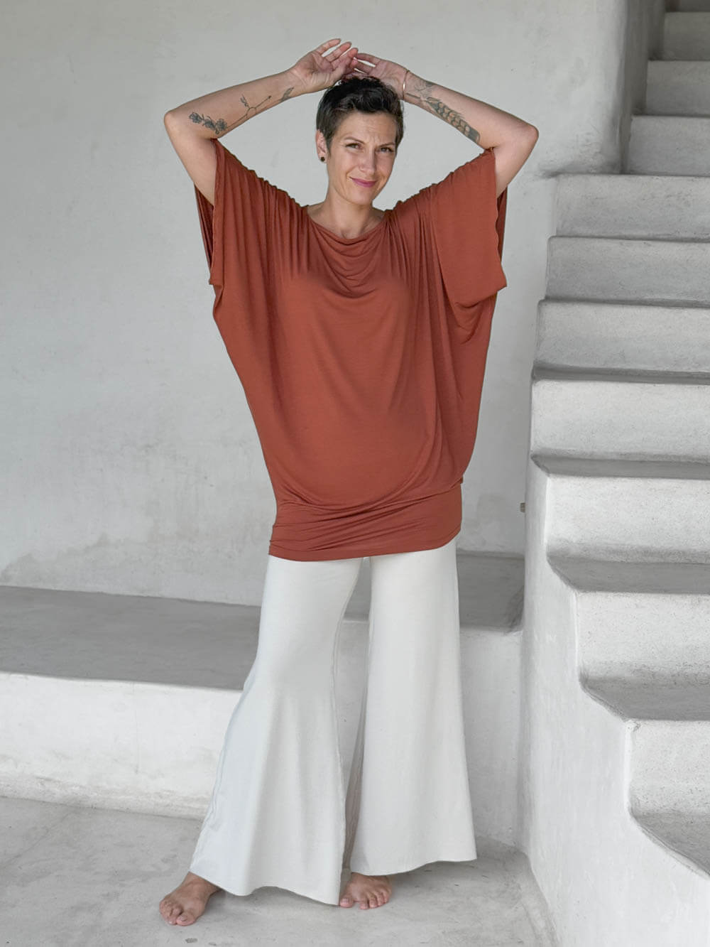 caraucci copper kimono tunic worn as a tunic with cream pants #color_copper