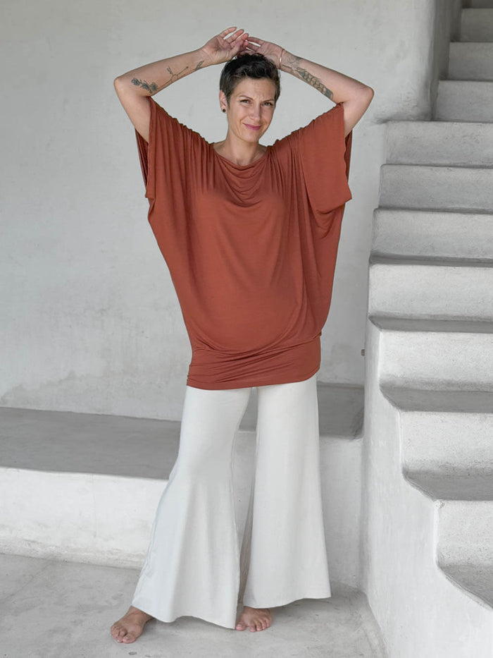 caraucci copper kimono tunic worn as a tunic with cream pants #color_copper