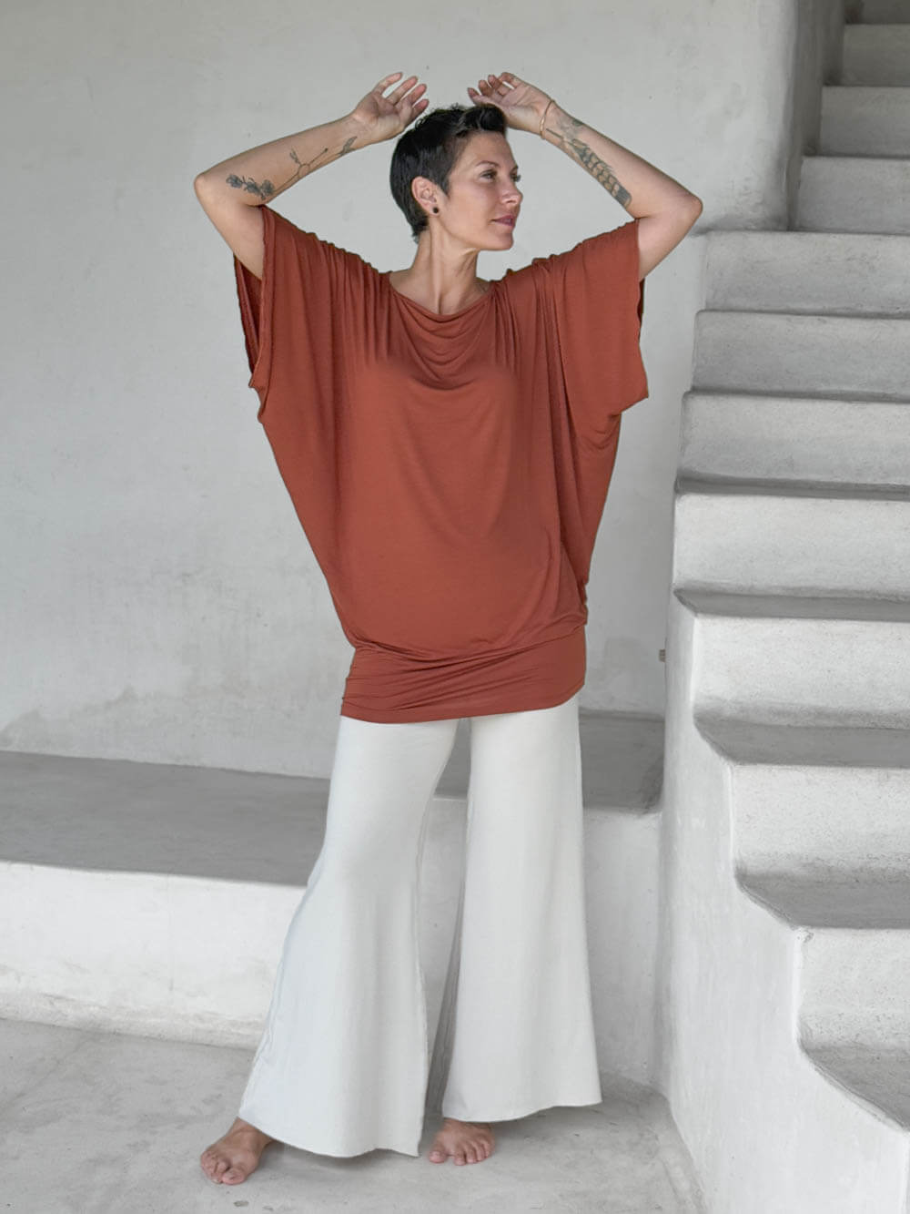 caraucci copper kimono tunic worn as a tunic with cream pants #color_copper