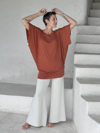caraucci copper kimono tunic worn as a tunic with cream pants #color_copper