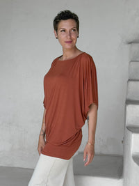 caraucci copper kimono tunic worn as a tunic with cream pants #color_copper