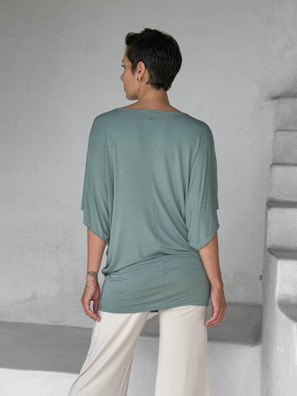 caraucci moss kimono tunic worn as a tunic with cream pants #color_moss