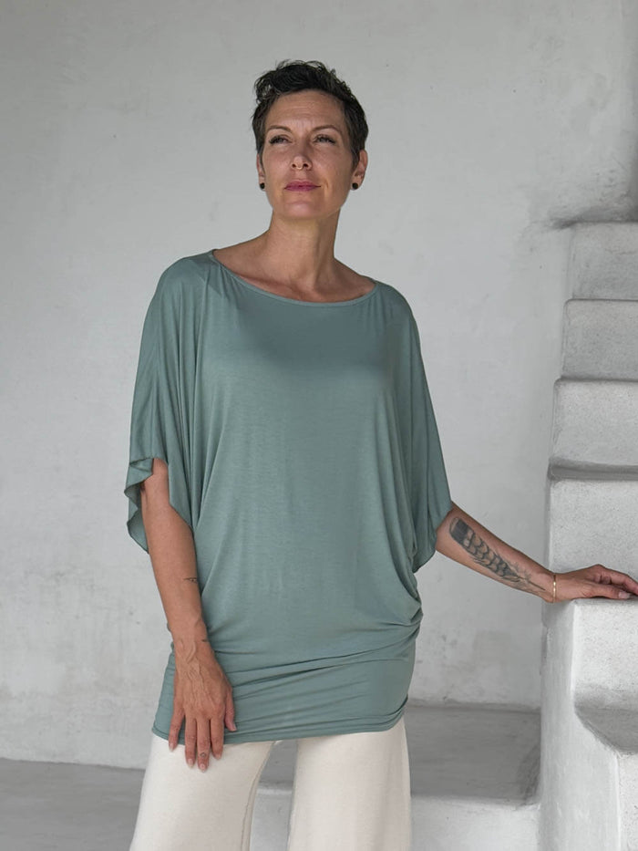 caraucci moss kimono tunic worn as a tunic with cream pants #color_moss