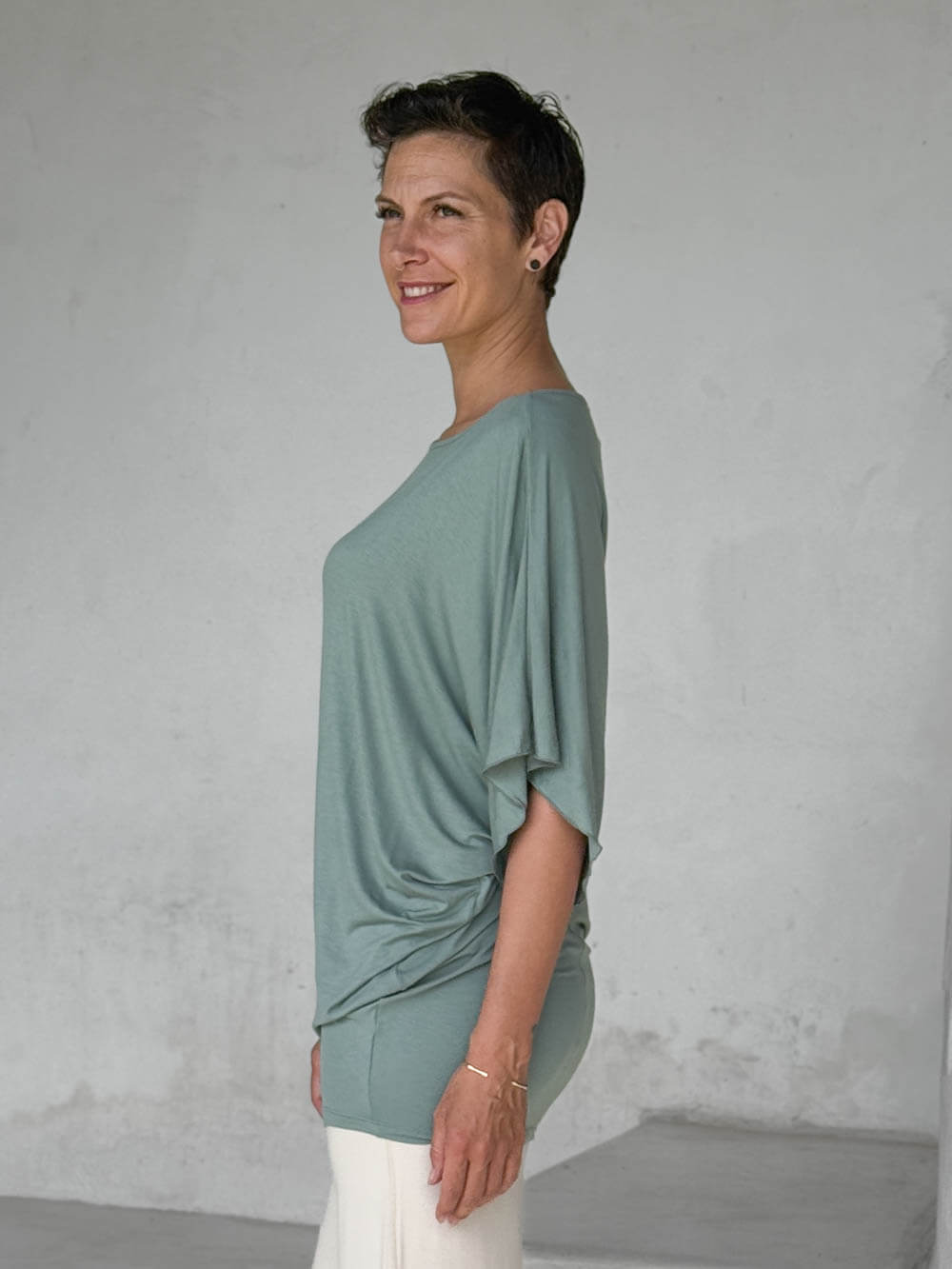 caraucci moss kimono tunic worn as a tunic with cream pants #color_moss