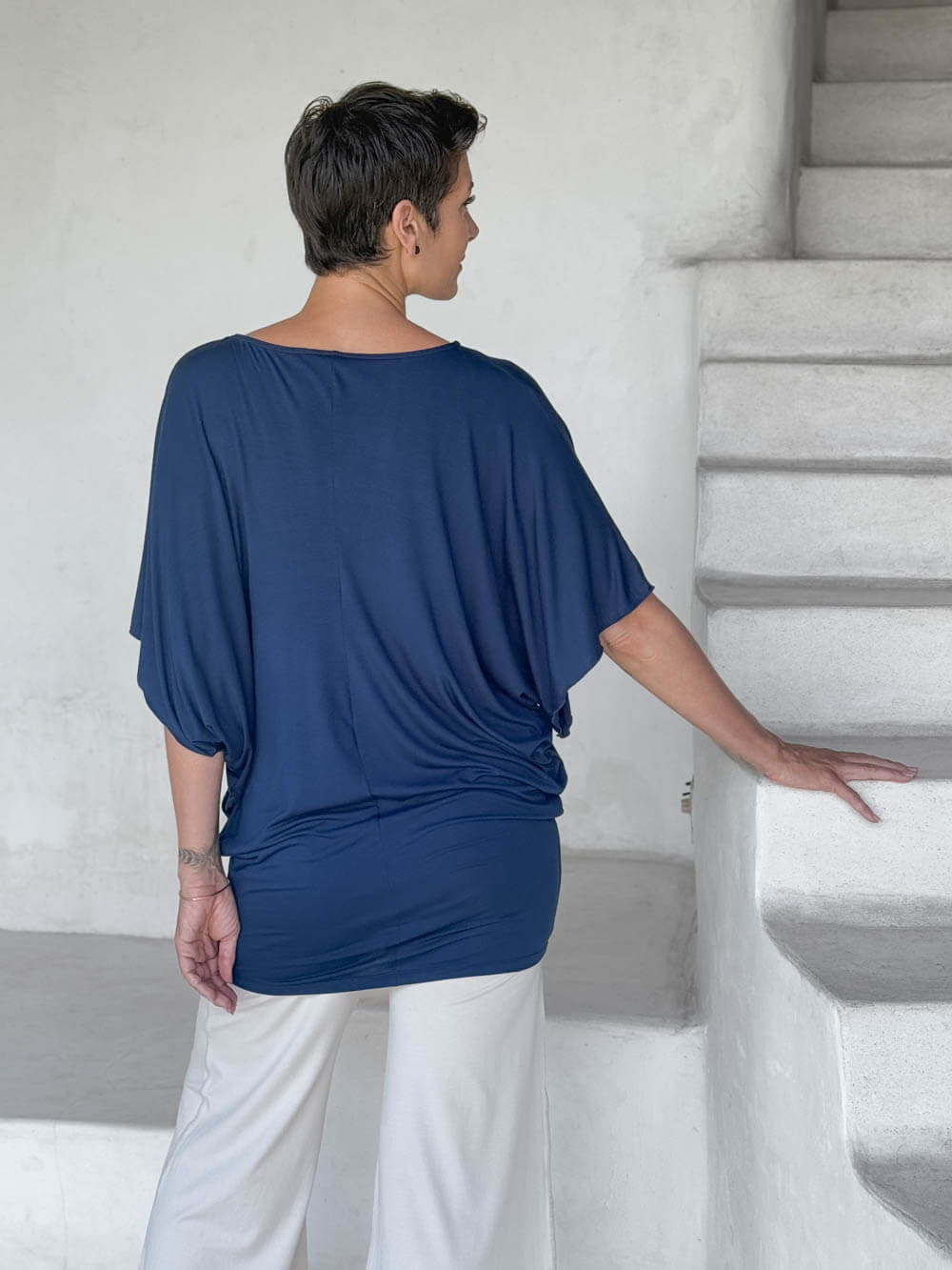 caraucci navy kimono tunic worn as a tunic with cream pants #color_navy