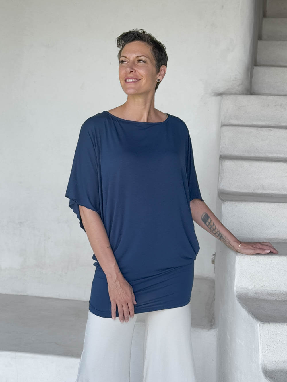 caraucci navy kimono tunic worn as a tunic with cream pants #color_navy