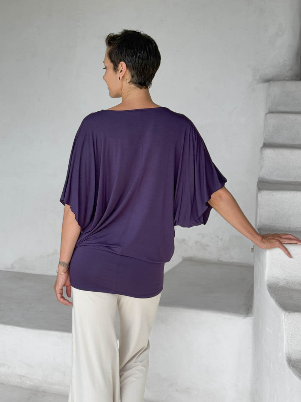 caraucci plum kimono tunic worn as a tunic with cream pants #color_plum