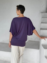 caraucci plum kimono tunic worn as a tunic with cream pants #color_plum