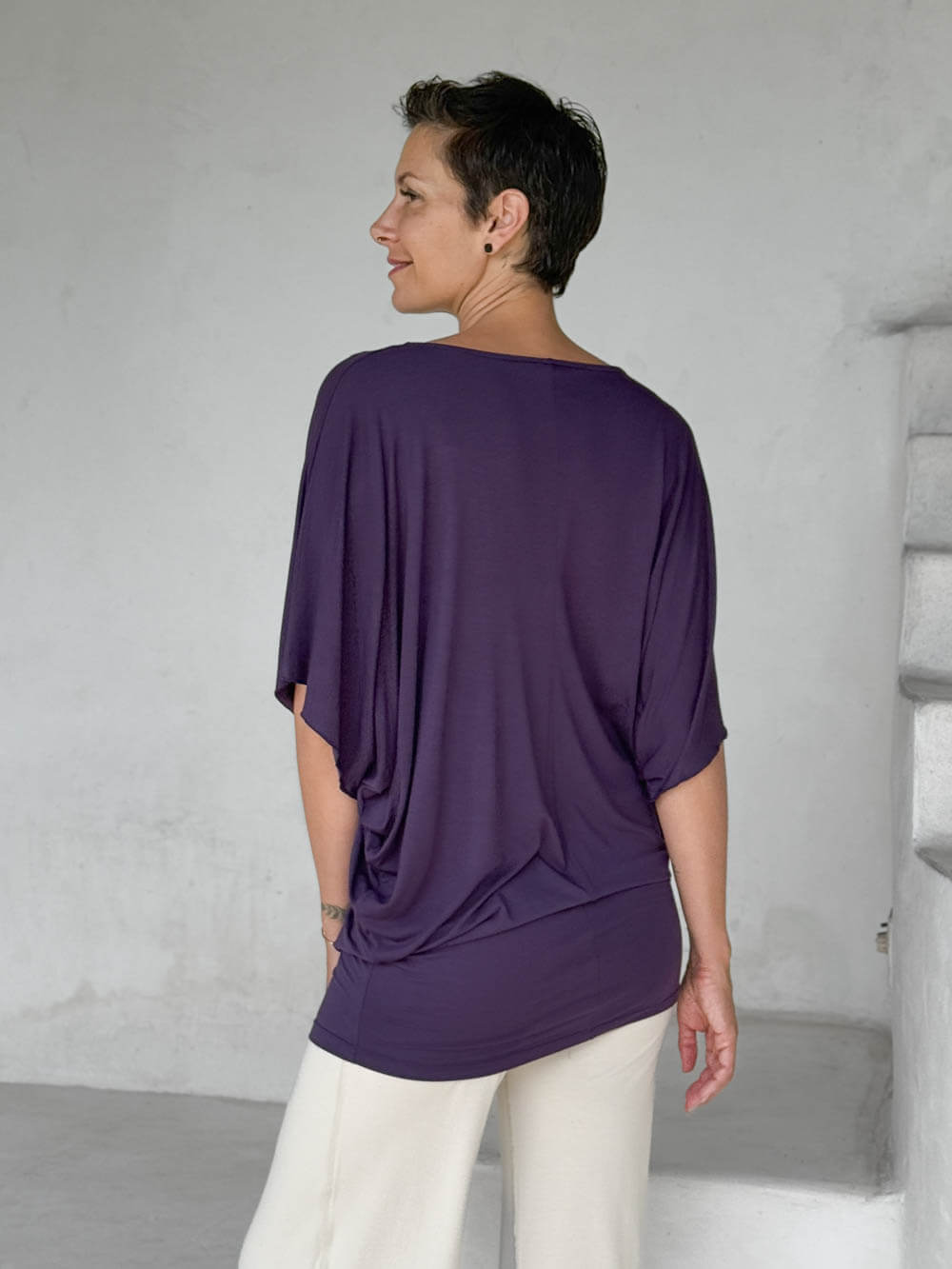 caraucci plum kimono tunic worn as a tunic with cream pants #color_plum