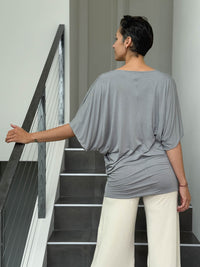 caraucci gray dolman sleeve draped tunic worn as a tunic with cream pants #color_stone